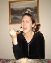 Me eating a yummy gluten and dairy-free pink birthday cake (with lollies)