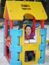 Me playing in the childrens’ cubby house…